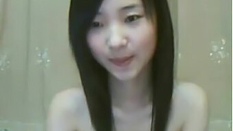 Petite Asian Woman Masturbates On Webcam