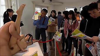 Young Japanese Women Get Intimate With American Men At An Art Exhibition