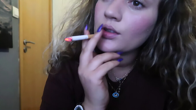 European Teen With Big Tits Kisses And Smokes Cigar In Close-Up